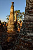 Inle Lake Myanmar. Indein, on the summit of a hill the  Shwe Inn Thein Paya a cluster of hundreds of ancient stupas. Many of them are ruined and overgrown with bushes. 